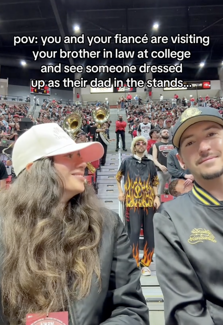 couple at a basketball game